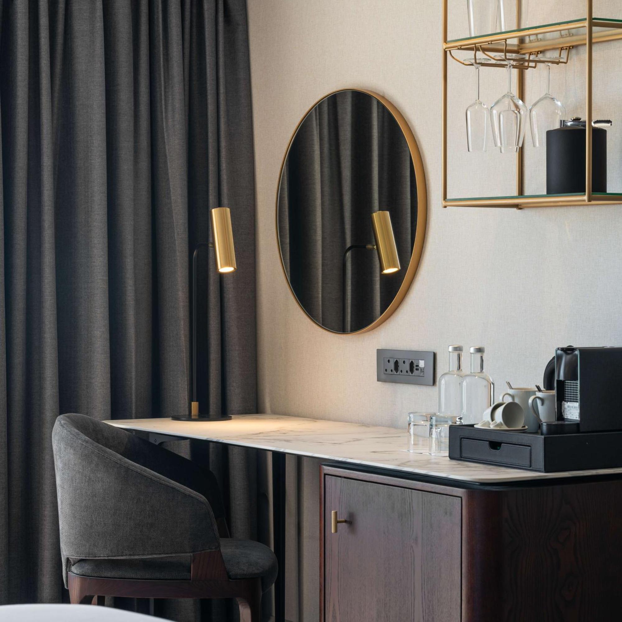 Radisson Collection Hotel, Waterfront Fokváros Kültér fotó A Nespresso machine in a hotel room