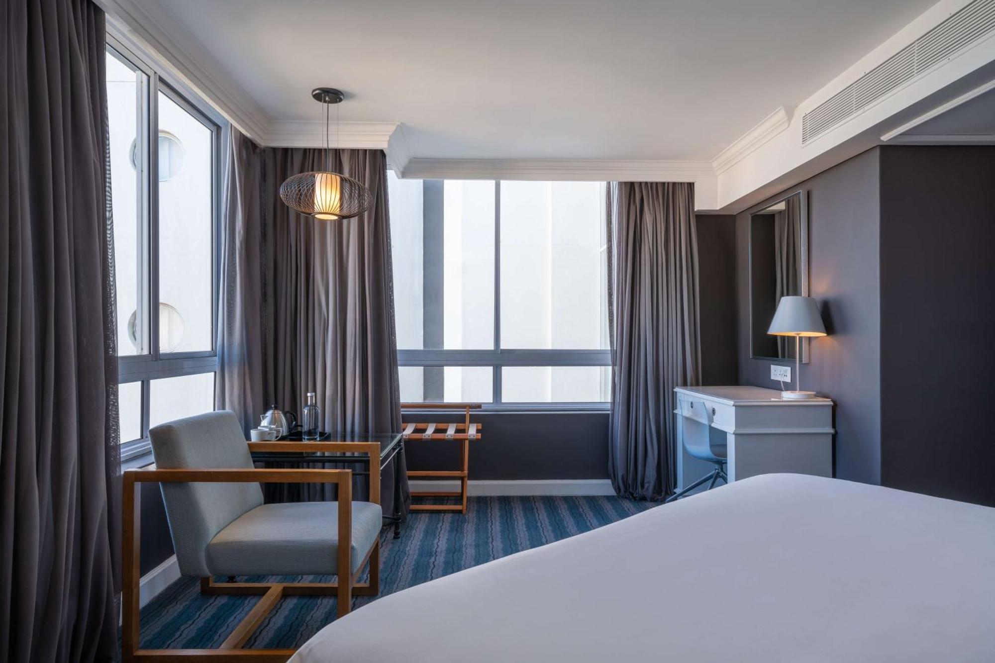 Radisson Collection Hotel, Waterfront Fokváros Kültér fotó A room at the hotel